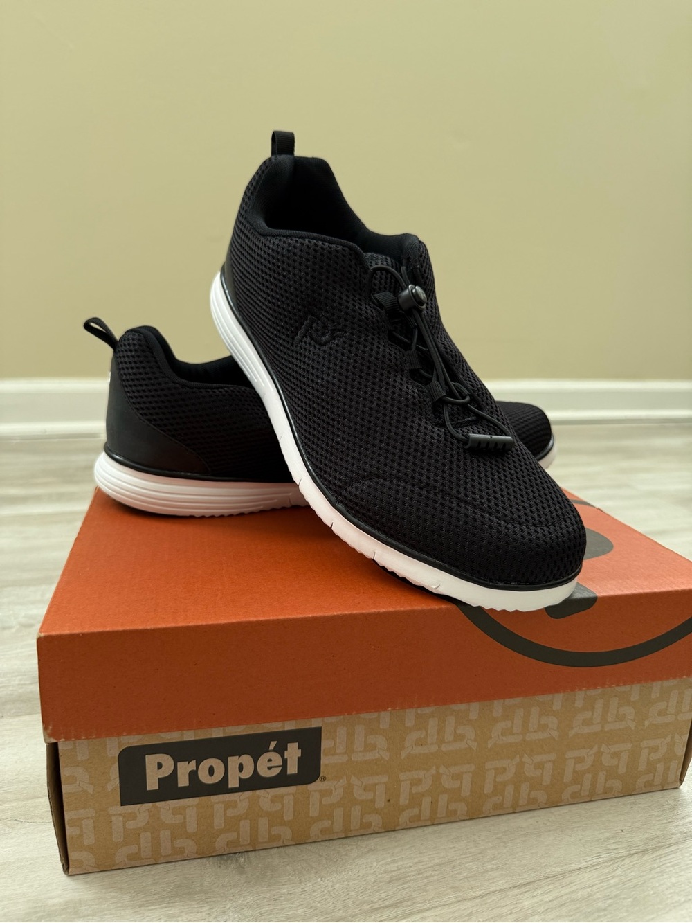 Propet Men's Black Mesh Slip-On Sneaker with White Sole